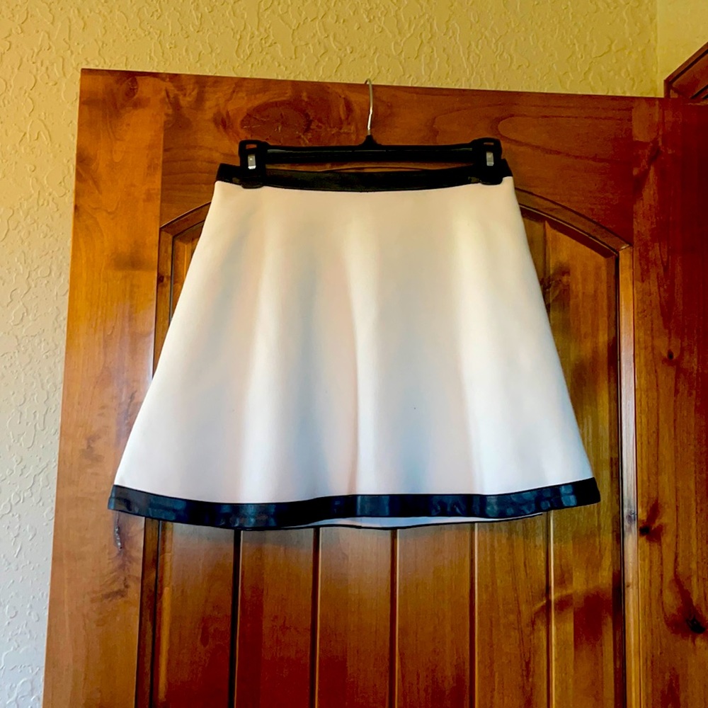 Leather trimmed satin-lined power skirt